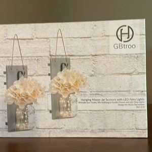Brand new hanging mason jar sconces with LED fairy lights